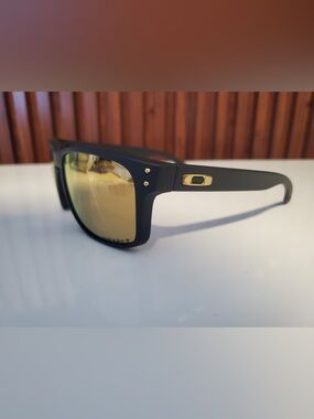 Oakley Black and gold sunglasses